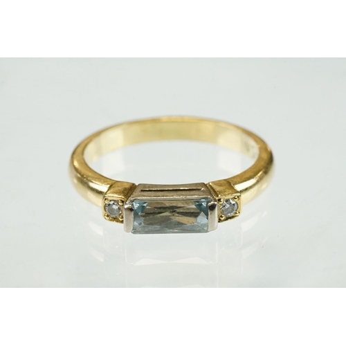 44 - Aquamarine and diamond 18ct yellow gold ring, the rectangular mixed cut aquamarine measuring approx ... 