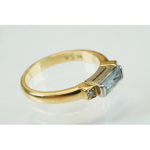 44 - Aquamarine and diamond 18ct yellow gold ring, the rectangular mixed cut aquamarine measuring approx ... 