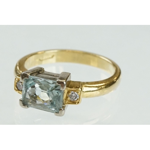 45 - Aquamarine diamond 18ct yellow gold ring, the rectangular mixed cut aquamarine measuring approx 7.5m... 