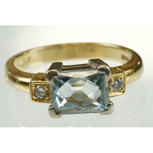 45 - Aquamarine diamond 18ct yellow gold ring, the rectangular mixed cut aquamarine measuring approx 7.5m... 