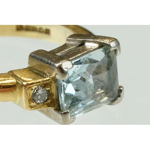 45 - Aquamarine diamond 18ct yellow gold ring, the rectangular mixed cut aquamarine measuring approx 7.5m... 