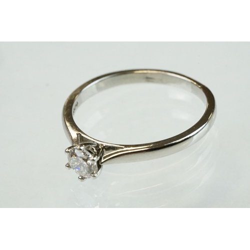 48 - Diamond solitaire platinum ring, the round brilliant cut diamond weighing approx 0.40 carat, six cla... 