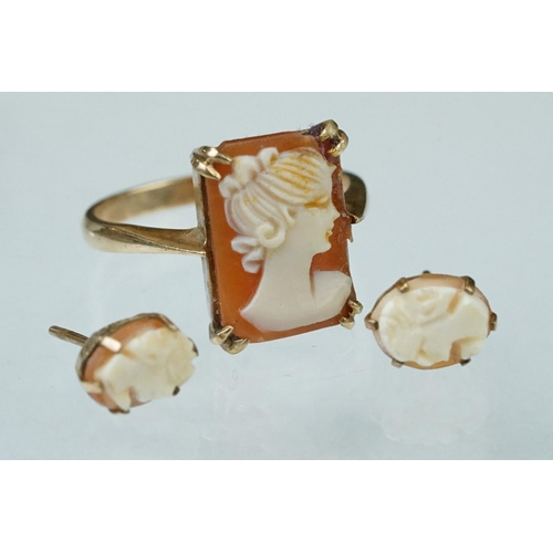 125 - Shell cameo yellow metal dress ring, size P-P½; together with a paste yellow metal dress ring, size ... 