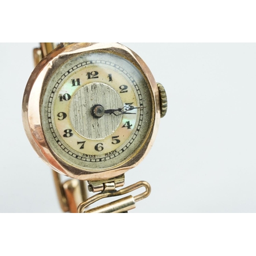 126 - Ladies 9ct rose gold cased wristwatch, mother-of-pearl and silvered dial, black Arabic numerals and ... 