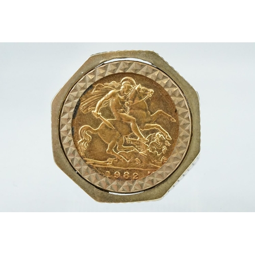 127 - Elizabeth II half sovereign coin ring, 1982, George and the Dragon back, 9ct gold textured ring moun... 