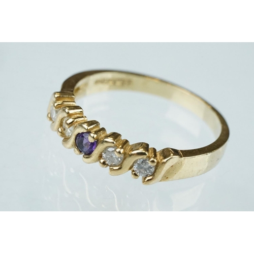 131 - Amethyst and diamond five stone 9ct yellow gold ring, four small round brilliant cut diamonds, small... 