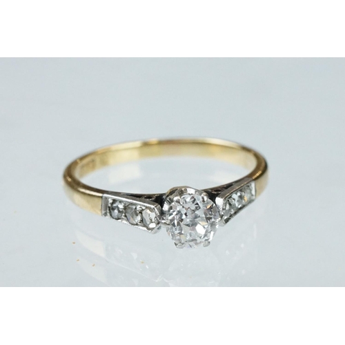 133 - Diamond solitaire 18ct yellow gold and platinum set ring, the round brilliant cut diamond weighing a... 