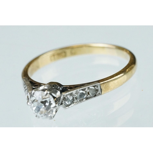 133 - Diamond solitaire 18ct yellow gold and platinum set ring, the round brilliant cut diamond weighing a... 