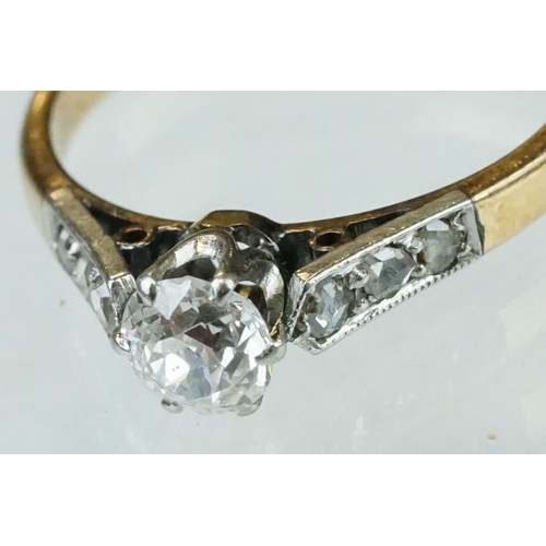 133 - Diamond solitaire 18ct yellow gold and platinum set ring, the round brilliant cut diamond weighing a... 