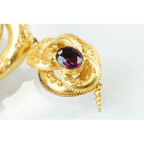 136 - Victorian garnet yellow metal brooch, six oval mixed cut purple garnets, rubover settings, floral, f... 