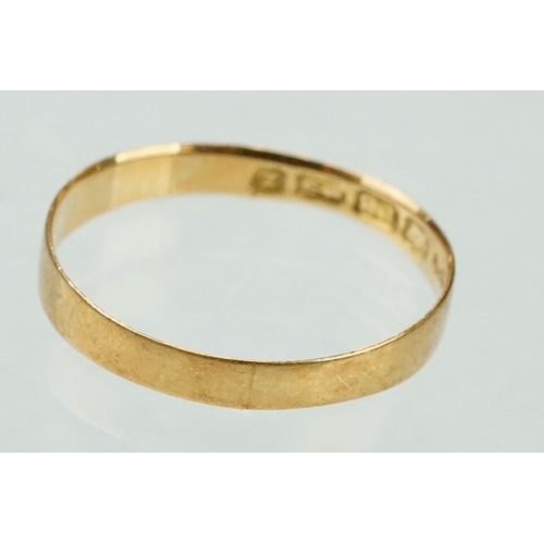 144 - 18ct yellow gold wedding band, band width 3mm, ring size O½; sapphire and diamond 9ct yellow gold dr... 