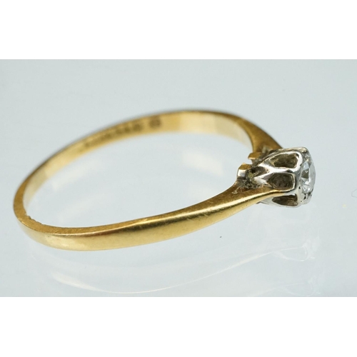 148 - Diamond solitaire 18ct yellow gold platinum set ring, the round old cut diamond weighing approx 0.07... 