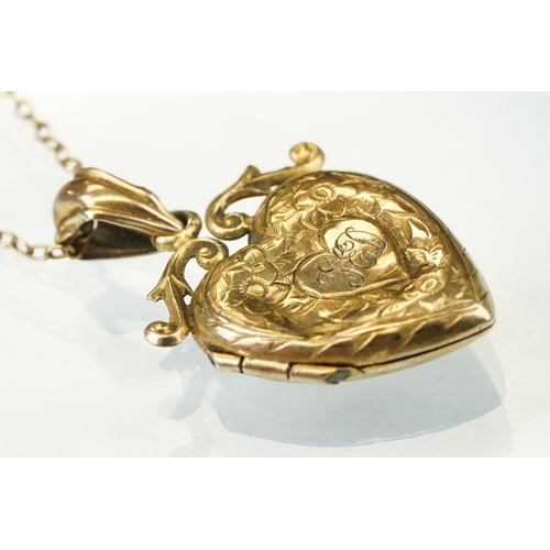 149 - Edwardian 9ct yellow gold heart shaped locket pendant necklace, engraved floral and foliate decorati... 