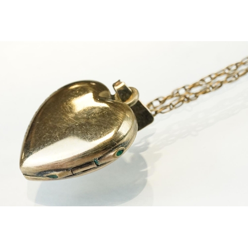 149 - Edwardian 9ct yellow gold heart shaped locket pendant necklace, engraved floral and foliate decorati... 