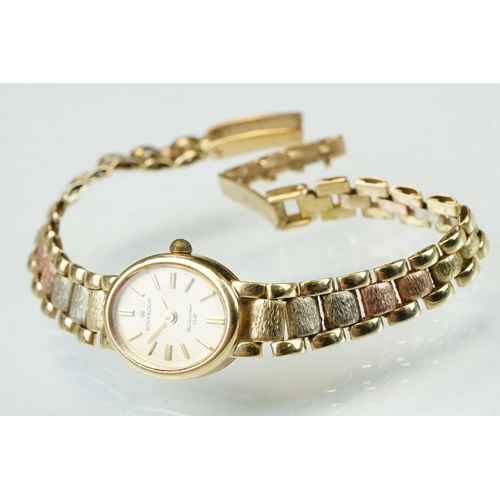 150 - Sovereign 9ct yellow gold ladies wristwatch, oval gilt dial with gilt baton numerals and poker hands... 