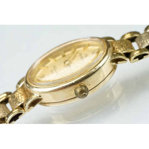 150 - Sovereign 9ct yellow gold ladies wristwatch, oval gilt dial with gilt baton numerals and poker hands... 