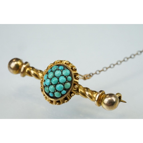 153 - 19th century turquoise yellow metal bar brooch, the central oval panel set with nineteen graduated s... 