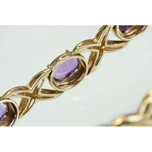 181 - Amethyst 9ct yellow gold bracelet, ten oval mixed cut amethysts, measuring 8mm x 6mm, four claw sett... 