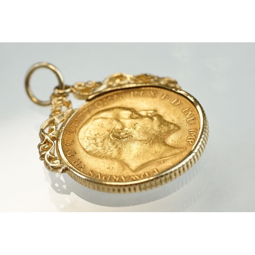 184 - Half sovereign coin, Edward VII, dated 1907, George and the Dragon back, 9ct gold scroll coin mount