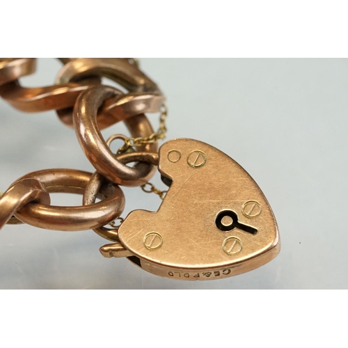 189 - 9ct rose gold curb link bracelet with padlock clasp, each link stamped 9c, width approx 1cm