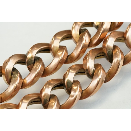 189 - 9ct rose gold curb link bracelet with padlock clasp, each link stamped 9c, width approx 1cm