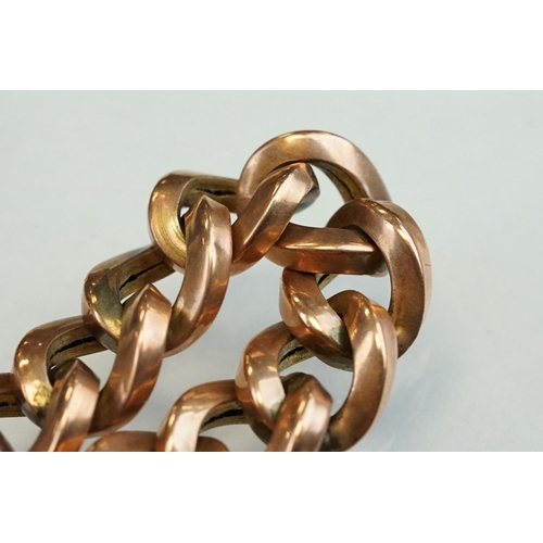 189 - 9ct rose gold curb link bracelet with padlock clasp, each link stamped 9c, width approx 1cm