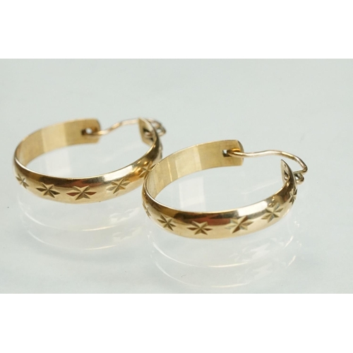 194 - Pair of 9ct yellow gold hoop earrings, bright cut repeating star decoration, length approx 2cm; toge... 