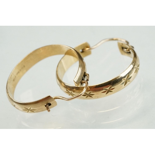 194 - Pair of 9ct yellow gold hoop earrings, bright cut repeating star decoration, length approx 2cm; toge... 