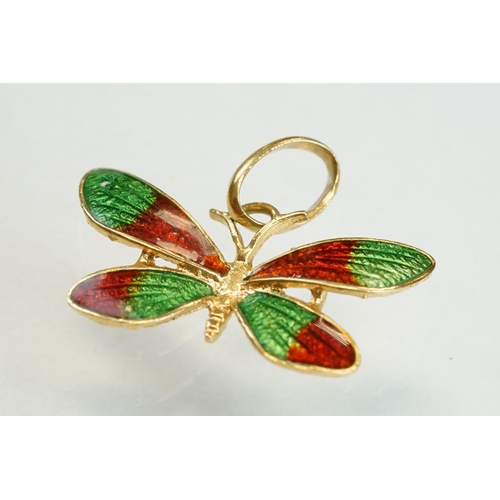 195 - Enamelled 18ct yellow gold pendant modelled as a butterfly, red and green enamel, dimensions approx ... 