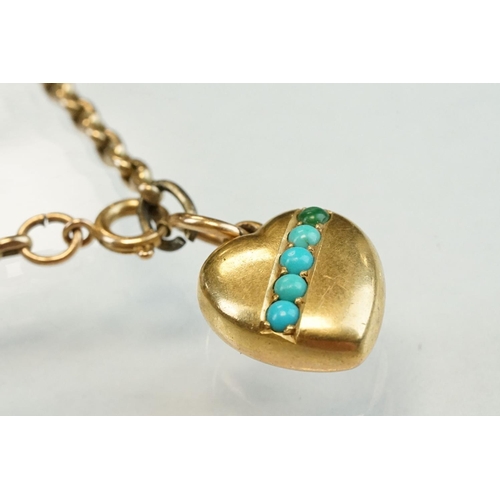 196 - Turquoise yellow metal heart shaped pendant, five small round cabochon cut turquoise, length approx ... 