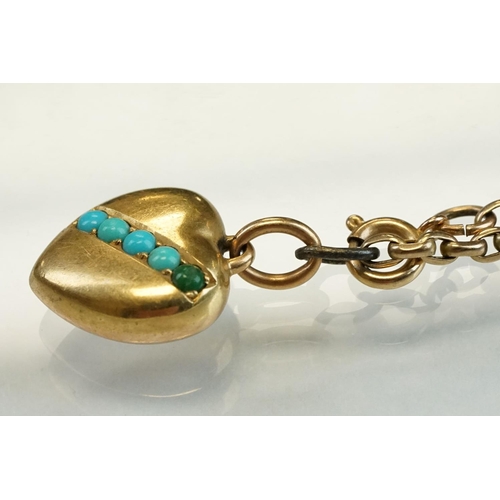 196 - Turquoise yellow metal heart shaped pendant, five small round cabochon cut turquoise, length approx ... 