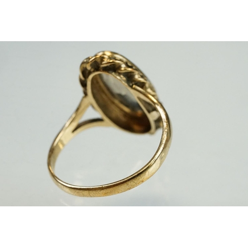 204 - Smoky quartz 9ct yellow gold ring, the oval mixed cut smoky quartz measuring approx 14mm x 6mm, rubo... 