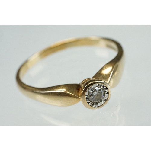 205 - Diamond solitaire 9ct yellow and white gold ring, the round brilliant cut diamond weighing approx 0.... 