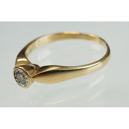 205 - Diamond solitaire 9ct yellow and white gold ring, the round brilliant cut diamond weighing approx 0.... 