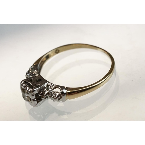 205 - Diamond solitaire 9ct yellow and white gold ring, the round brilliant cut diamond weighing approx 0.... 