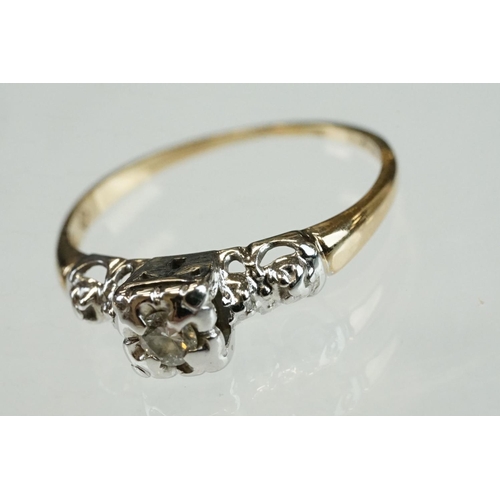 205 - Diamond solitaire 9ct yellow and white gold ring, the round brilliant cut diamond weighing approx 0.... 