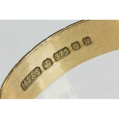 207 - 9ct yellow gold wedding band, engraved and bright cut decoration, the interior engraved MC-3, width ... 