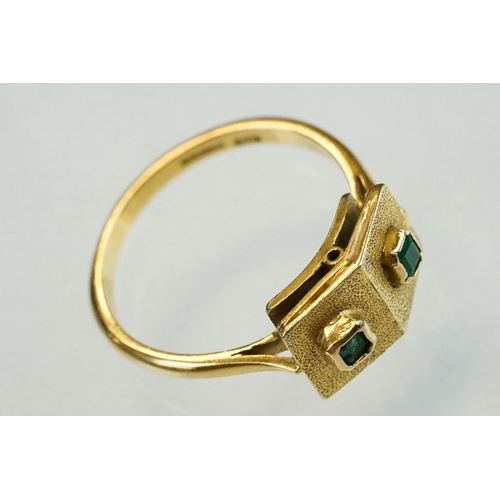 210 - Emerald 18ct yellow gold ring, two textured square heads, each containing a small square mixed cut e... 