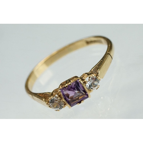 215 - Amethyst and cubic zirconia 9ct yellow gold three stone ring, size P½; an amethyst 9ct yellow gold d... 