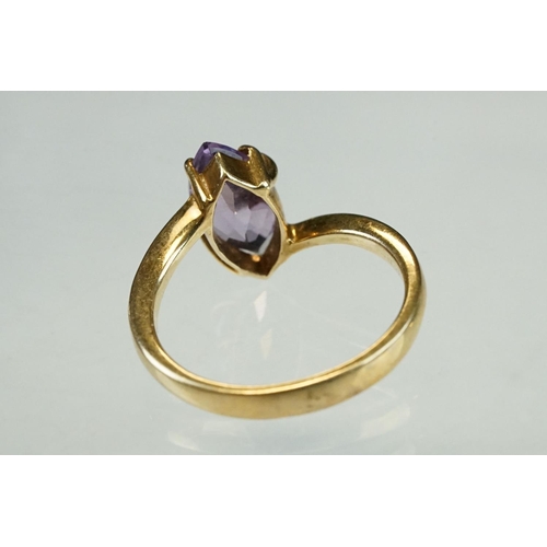 215 - Amethyst and cubic zirconia 9ct yellow gold three stone ring, size P½; an amethyst 9ct yellow gold d... 