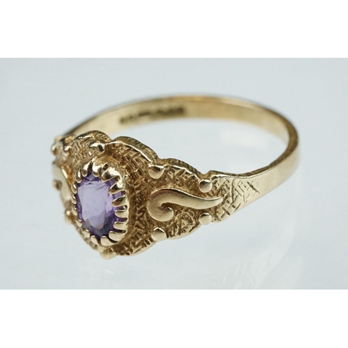 215 - Amethyst and cubic zirconia 9ct yellow gold three stone ring, size P½; an amethyst 9ct yellow gold d... 