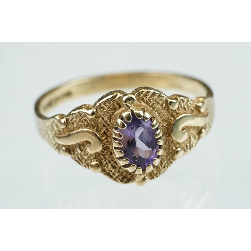 215 - Amethyst and cubic zirconia 9ct yellow gold three stone ring, size P½; an amethyst 9ct yellow gold d... 