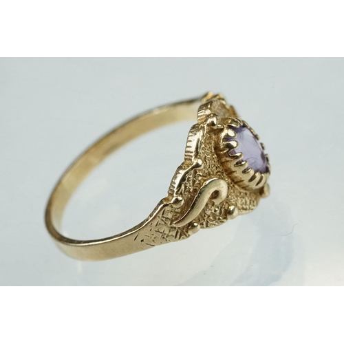 215 - Amethyst and cubic zirconia 9ct yellow gold three stone ring, size P½; an amethyst 9ct yellow gold d... 