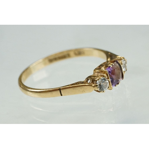 215 - Amethyst and cubic zirconia 9ct yellow gold three stone ring, size P½; an amethyst 9ct yellow gold d... 