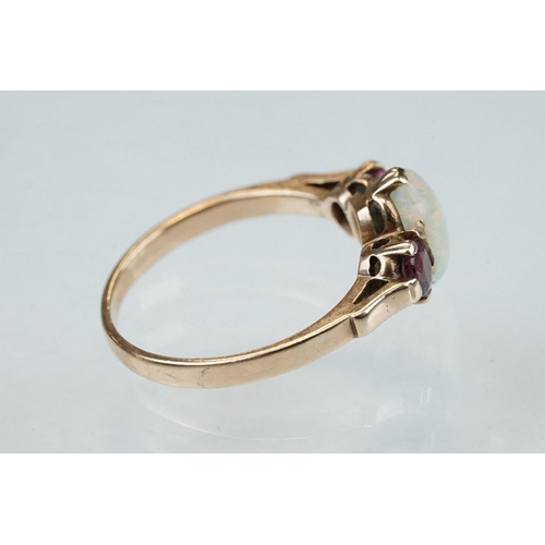 216 - Garnet 9ct yellow gold ring, oval cabochon cut garnet measuring approx 11.5mm x 5mm, rubover set, st... 