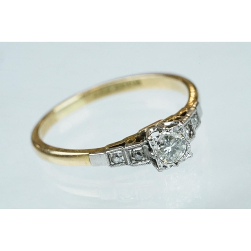 219 - Diamond 18ct yellow gold and platinum ring, the central round brilliant cut diamond weighing approx ... 