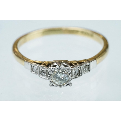 219 - Diamond 18ct yellow gold and platinum ring, the central round brilliant cut diamond weighing approx ... 