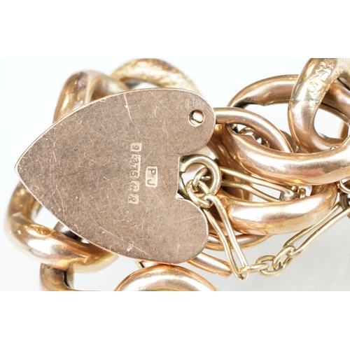 221 - 9ct rose gold curb link bracelet, textured alternate links, padlock clasp, each link stamped 9c