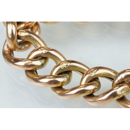 221 - 9ct rose gold curb link bracelet, textured alternate links, padlock clasp, each link stamped 9c