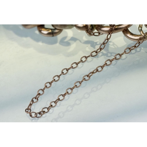 224 - Rose metal curb link bracelet, bolt ring clasp, each link indistinctly stamped